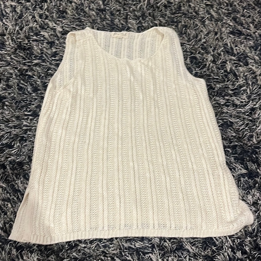 Women’s long knitted sweater sleeveless